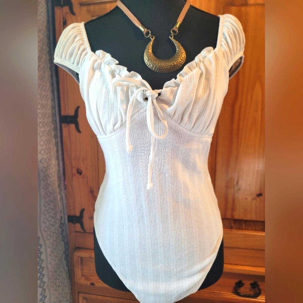 Elegant White Off-Shoulder Bodysuit